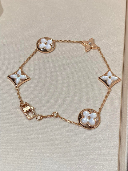 [Kismet Jewels ]STAR AND SUN 5 MOTIF MOP PINK GOLD BRACELET