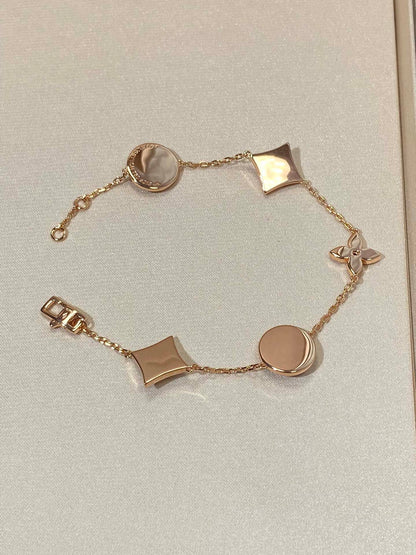 [Kismet Jewels ]STAR AND SUN 5 MOTIF MOP PINK GOLD BRACELET